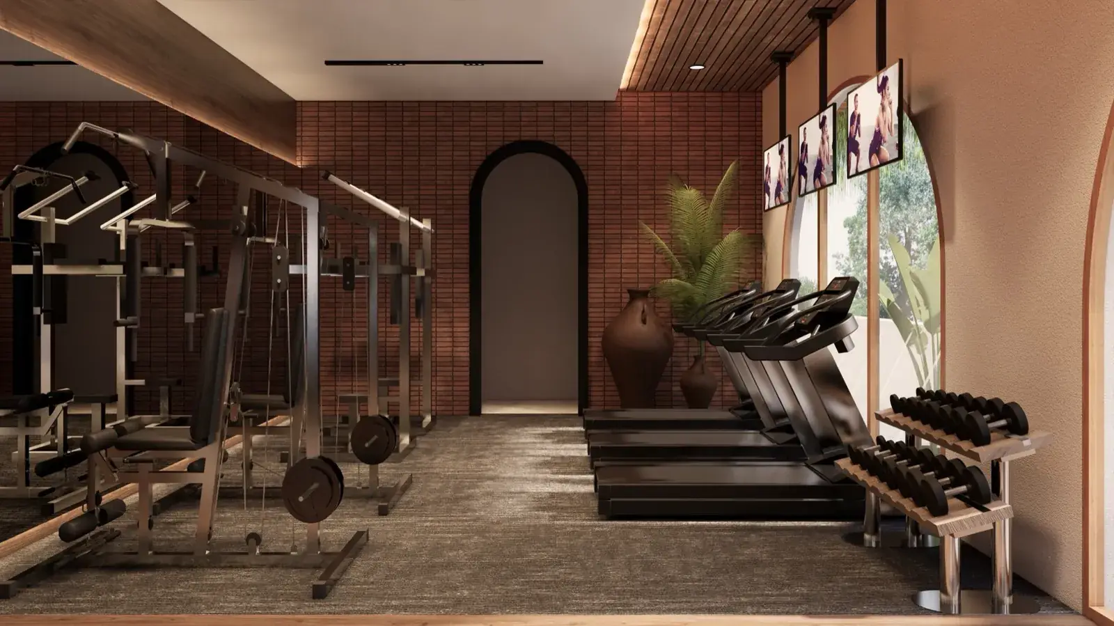Gym with treadmills against a brick wall